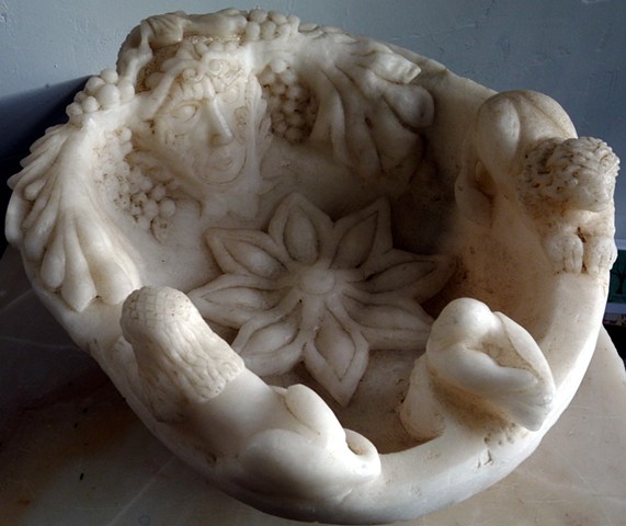 hand carved alabaster bowl with allegorical motifs
