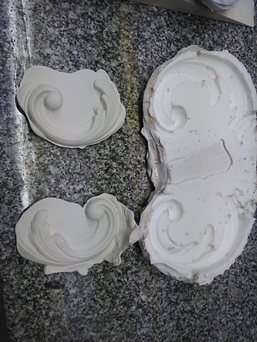 cast plaster elements made from an original plaster rosette