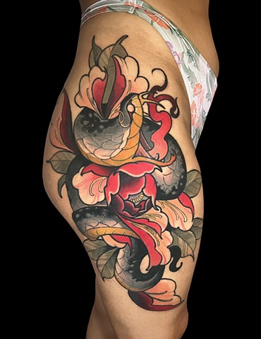 Neotraditional peony snake tattoo on female thighs hip dark skin large tattoo