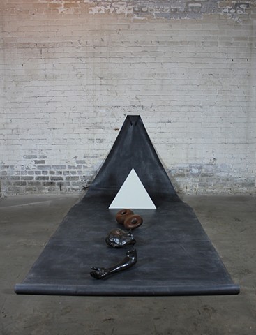 installation + sculpture + detroit, cast head, cast iron arm,  dreamscape, fragmented figure