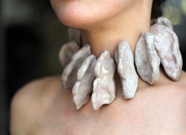 a one-of-a-kind sculptural neckpiece composed of copper forms that are coated in flesh tone enamel