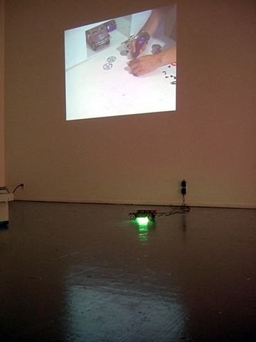 installation view: 'Wouldn't It Be (Ice, Ice)' showing 'Katie's Custom Car Shack' video