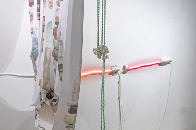 detail: 'Composition for the plastic surgery clinic at the back of the gallery because: Heart! in three neon pinks with blob curtain arrangement and booby-trap dongle dangle'