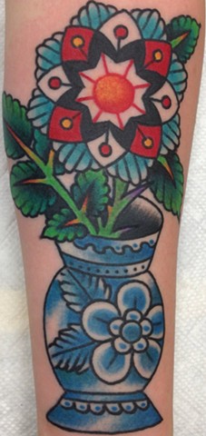 Geometric Flower & Vase Tattoo by Greg Christian