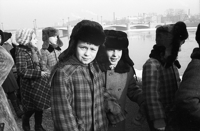 School children walking along the river Neva