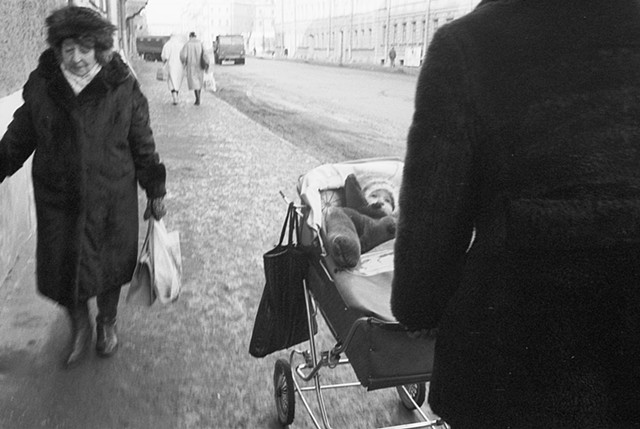 Older woman and baby in buggy