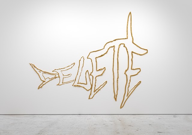  DELETE, in Vandalism font, with fish transform