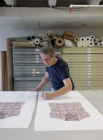 Signing the edition of screenprints