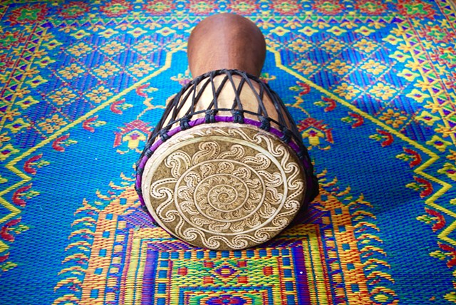 Henna drum head