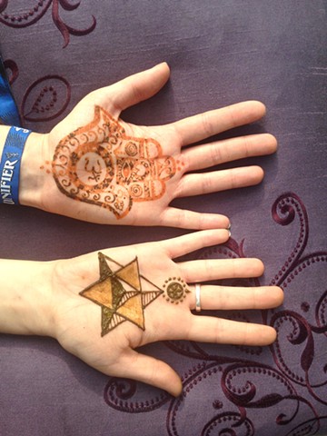 Henna hands with sacred geometry