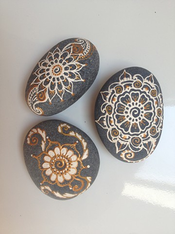 Hand painted decorative beach rocks
