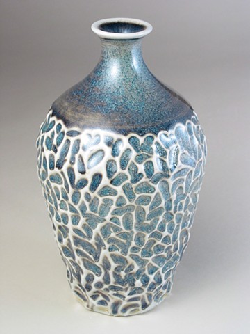 carved bottle, soda fired