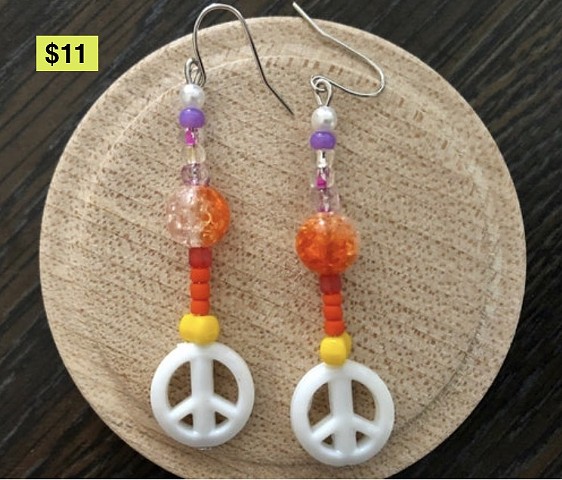 dangle earrings with peace sign bead