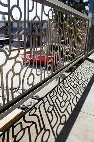 The Astro Circuit art panels make up 300' of balcony railings at the Astro Hotel in Santa Rosa, Ca.