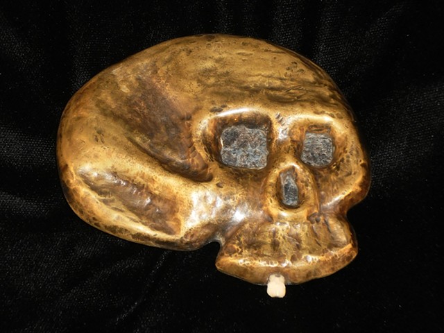 Skull, belt buckle, human tooth, tooth, William Amoureux, Will Amoureux, Amoureux