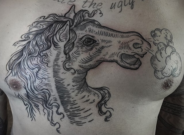 Horse chest tattoo