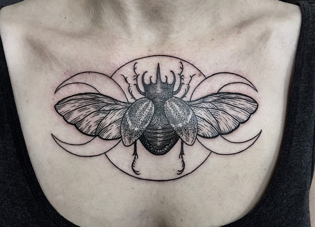 Scarab beetle chest tattoo New Haven ct