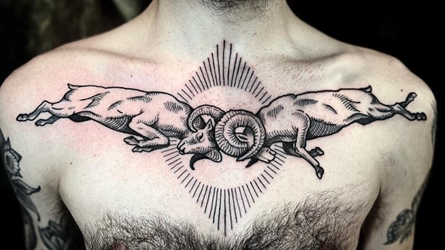 Ram fight chest tattoo woodcut New Haven ct female tattoo artist