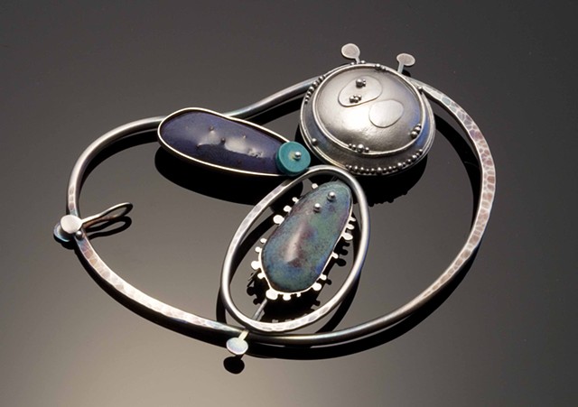 silver and enamel brooch with granulation