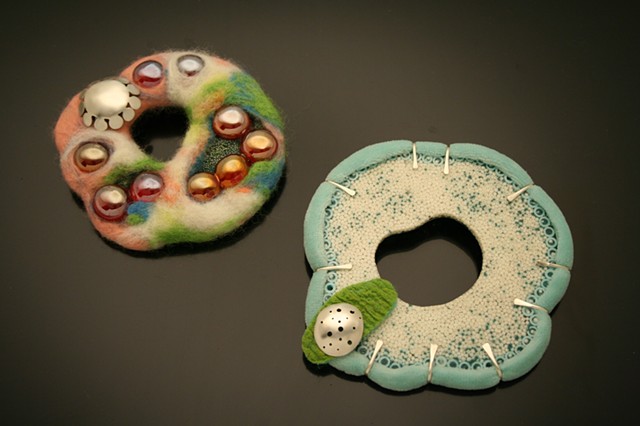 silver, resin, and wool brooches. Mixed media jewelry