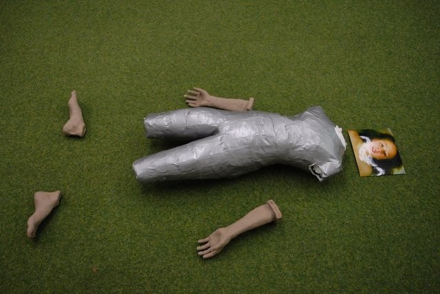 Life-size sculpture of a child in pieces