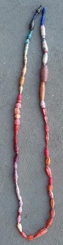 Handmade paper beads, magenta stripes