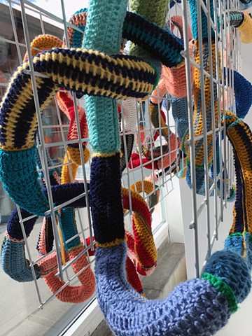 Crocheted yarn window installation 