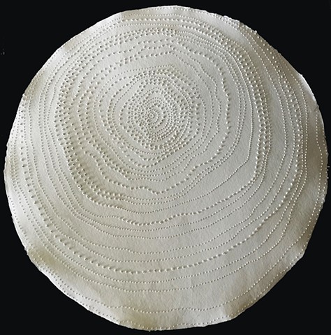 Contemporary mandala on pierced handmade paper round by Carmi Weingrod