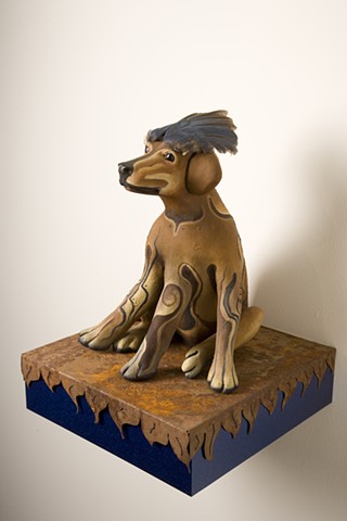 painted five legged dog with scrub jay wings on head.