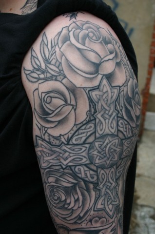 celtic cross done in 1997, roses added in 2002