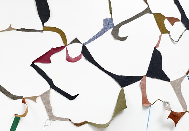 fabric remnants and mixed media in an abstract wall drawing, site-responsive