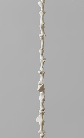 a floor to ceiling piece by Laura Evans that references Brancusi's iconic work. Abstract, site specific