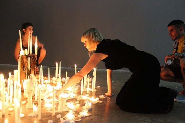Lighting candles for Project Room installation, Primary Projects