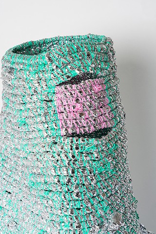  Detail of abstract coiled basket made with emergency blankets and mint plastic lacing by José Santiago Pérez