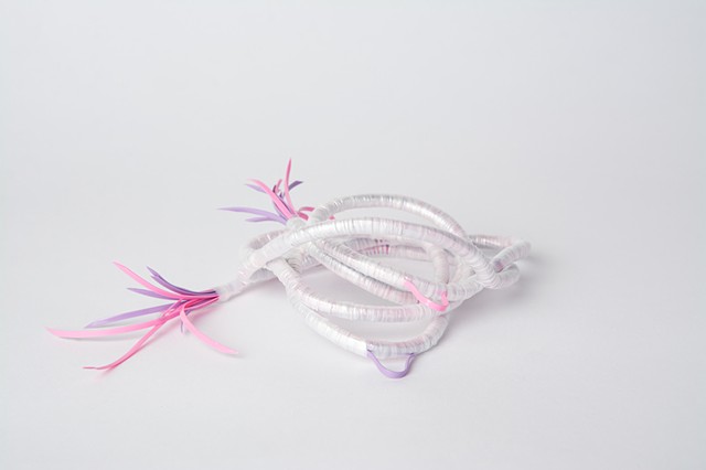 abstract plastic basket in pink and lavender by Jose Santiago Perez