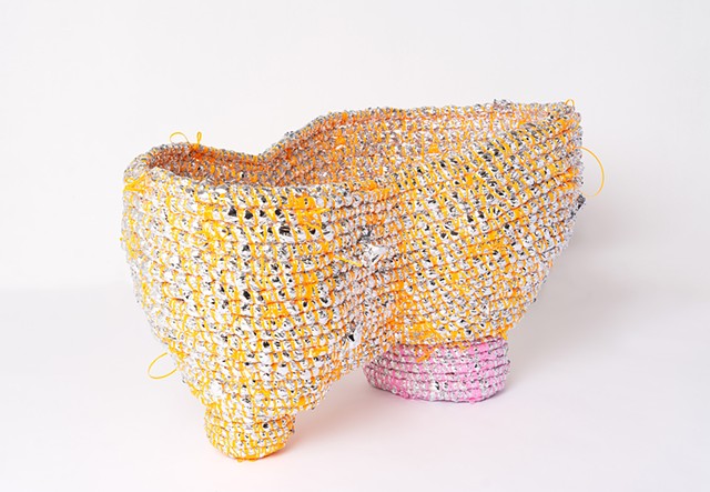 abstract coiled basket made with emergency blankets and tangerine and pink plastic lacing by José Santiago Pérez