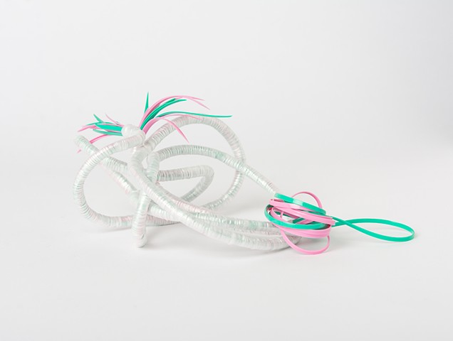 abstract plastic basket in pink and mint by Jose Santiago Perez