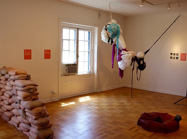 Installation view of plastic and fabric performance based sculpture with photo documentation by Jose Santiago Perez for group show Soft Sculpture at International Museum of Surgical Science Chicago