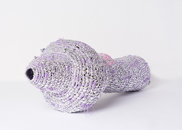 Alternate view of abstract coiled basket made with emergency blankets and lavender plastic lacing by José Santiago Pérez