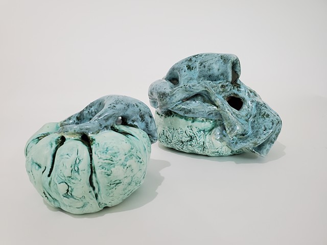 two ceramic vessels with a hole in the middle of each one, drapery coming out of the top, glazed, Kusama Ceramics, pumpkins