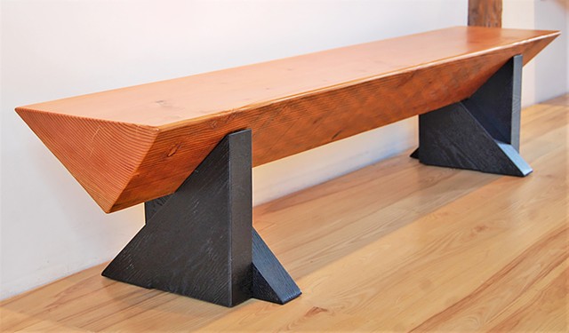 Isosceles Timber Bench, Douglas Fir with black-painted triangular legs.  
15 x 90 x 18 high 