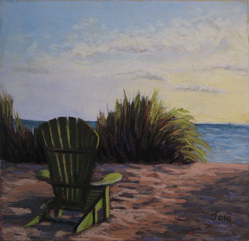  pastel painting of a green adirondack chair on the beach at sunset