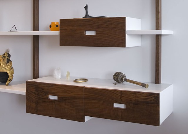 custom shelving unit with four drawers
