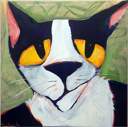 cat with green leaves