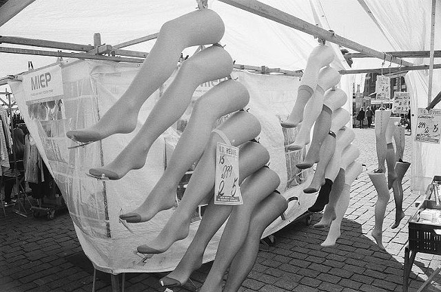 black and white, photo, flea market, legs, display,