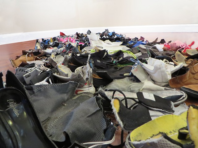 This. This Is My Land, Assemblage of Inter-Continental Collected Shoes from Migrants,  Various Dimensions