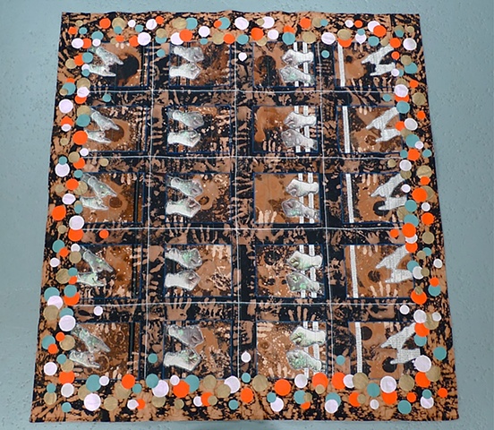 "Hands Squaring Off/ Space Quilt"