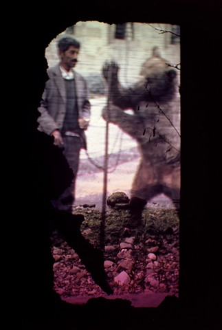 Man And His Bear. 2005. From: Projecting Windows. Mid-career retrospective. Chicago Cultural Center. 3.5ft x 5.5ft. Enduraclear transparency.