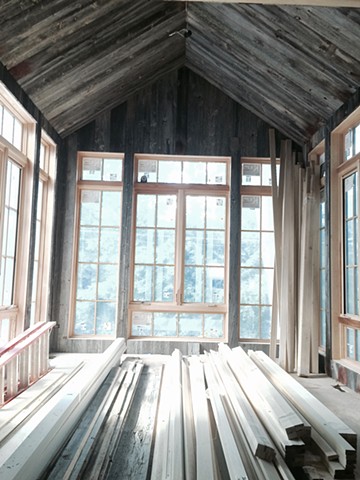 barn wood ceiling and walls in the breakfast room