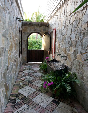 front entrance with horse trough as a fountain